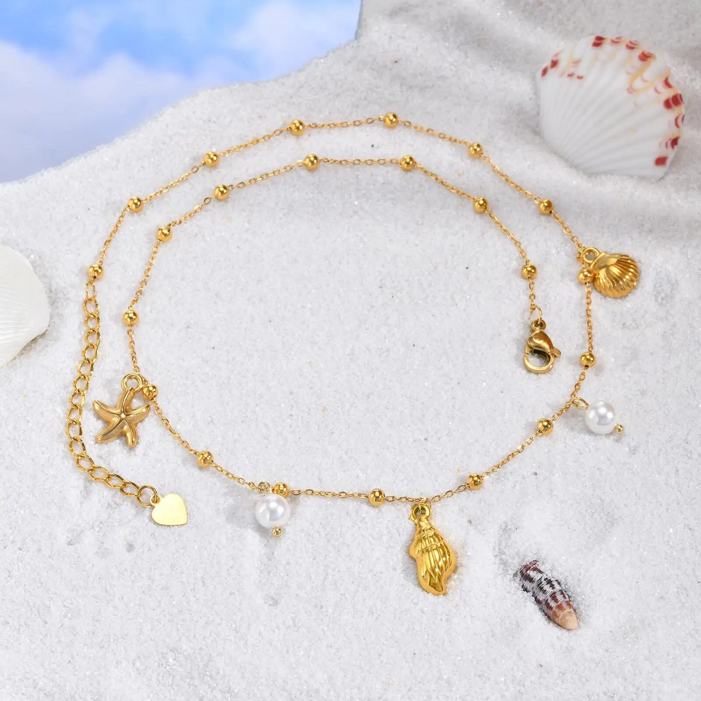 Collar de dijes de playa chapado en oro