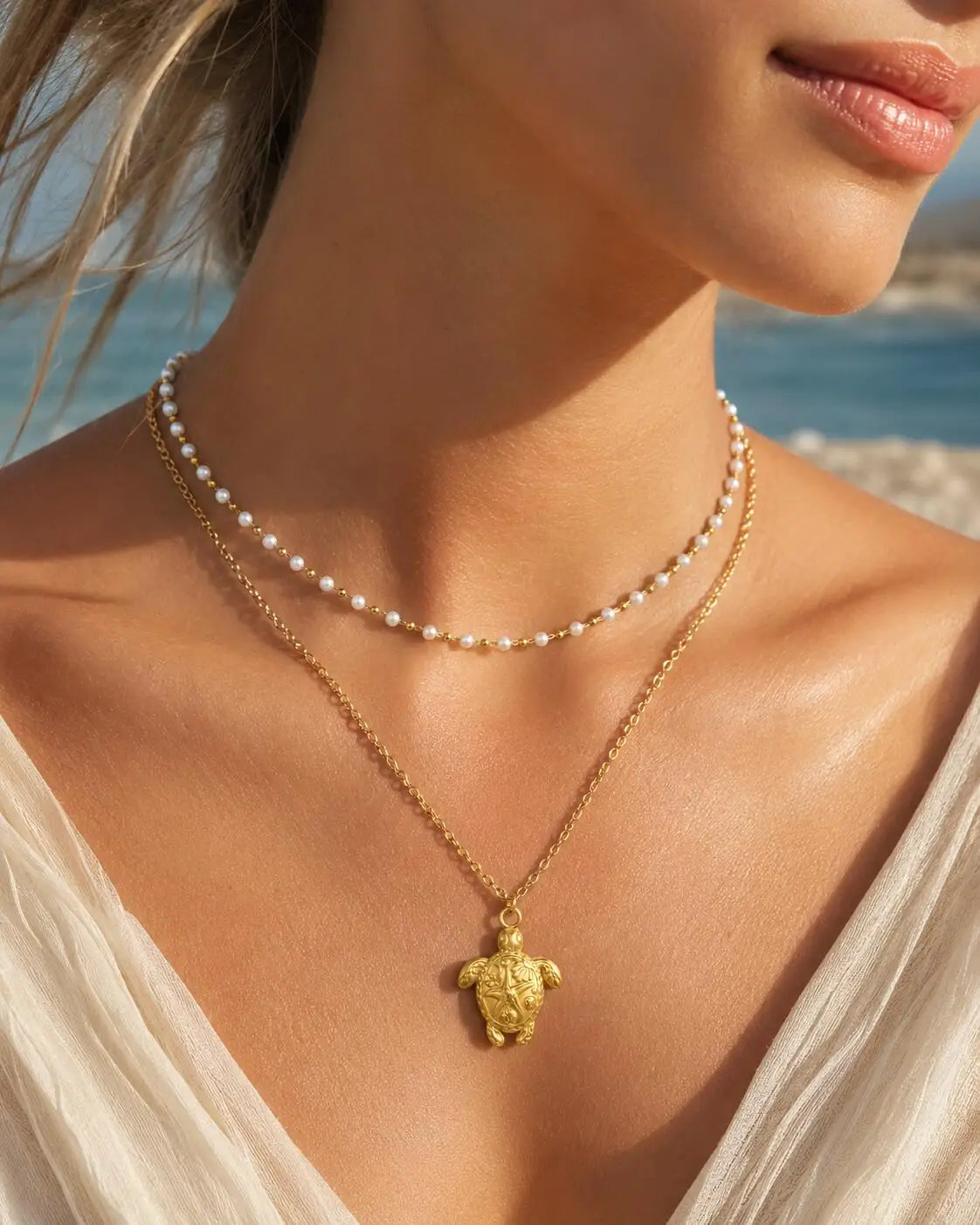 Collar de dijes de playa chapado en oro