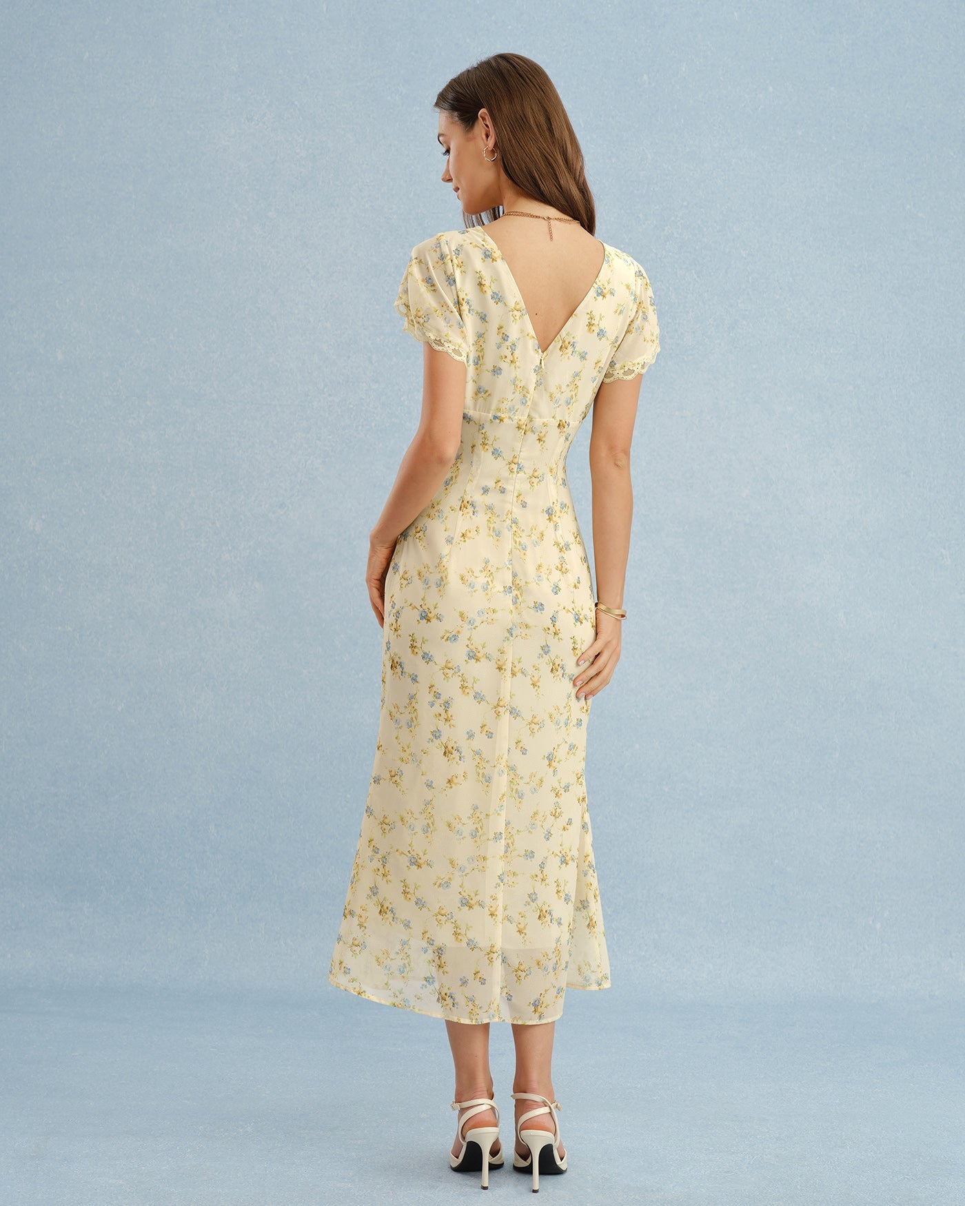 Vestido maxi amarillo radiante con escote en V y encaje floral