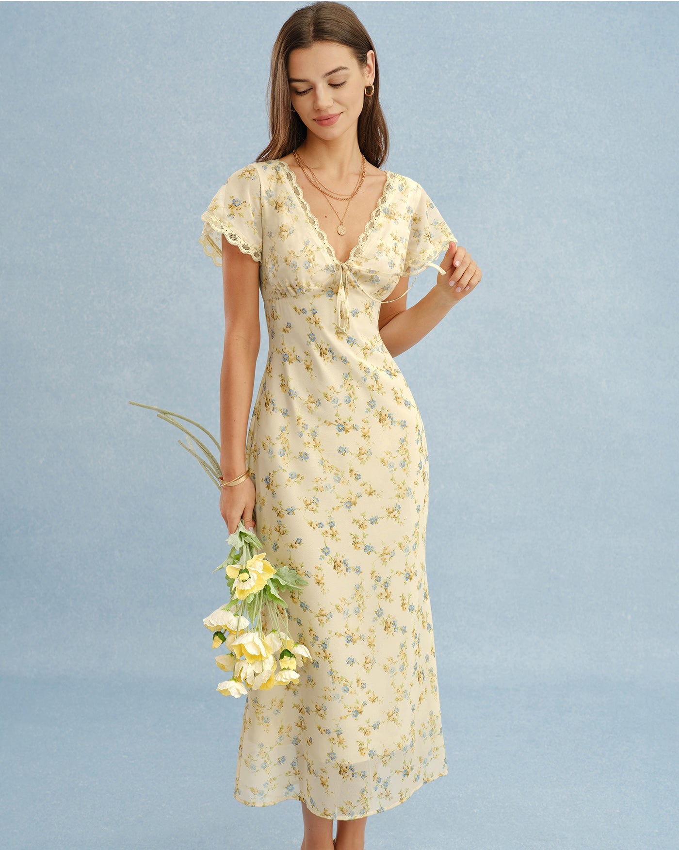Vestido maxi amarillo radiante con escote en V y encaje floral