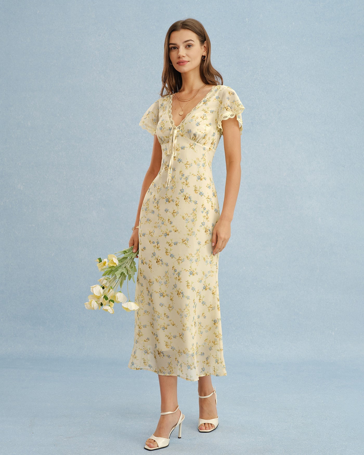 Vestido maxi amarillo radiante con escote en V y encaje floral