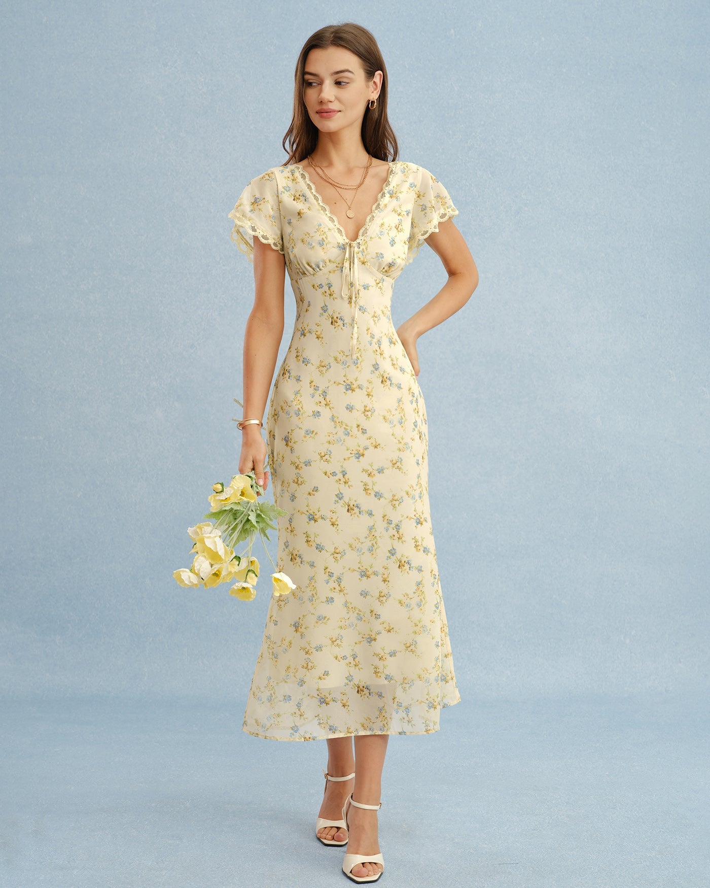 Vestido maxi amarillo radiante con escote en V y encaje floral